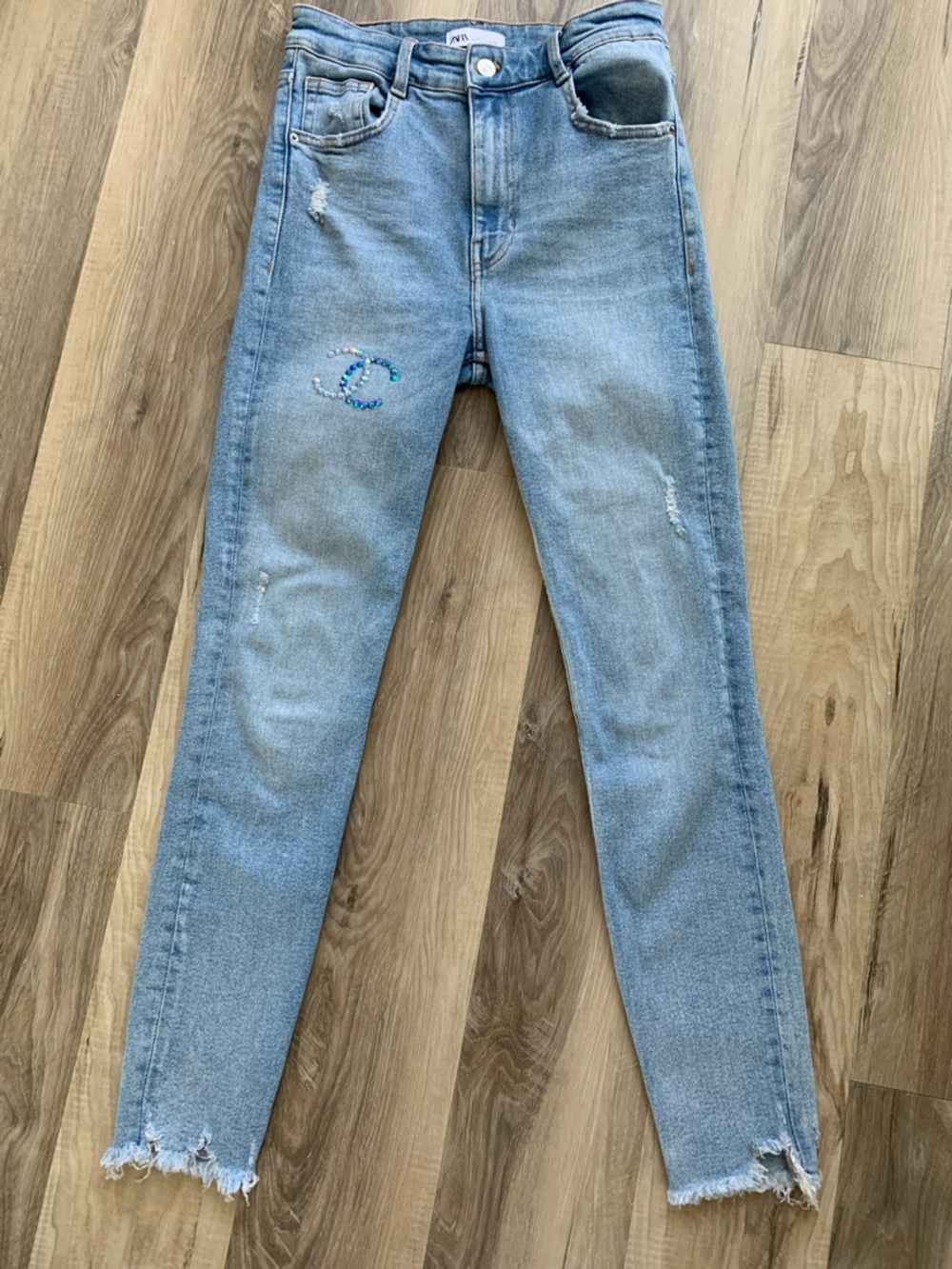 Zara Light Wash Jeans with C embellishments